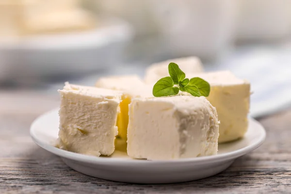 Butter cubes in plate — Stock Photo, Image