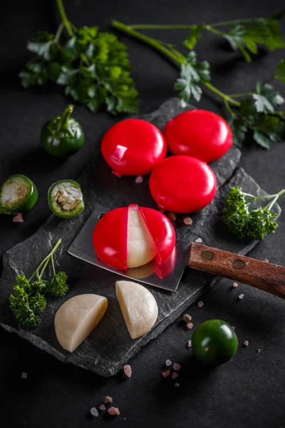 Cheese covered with red wax — Stock Photo, Image