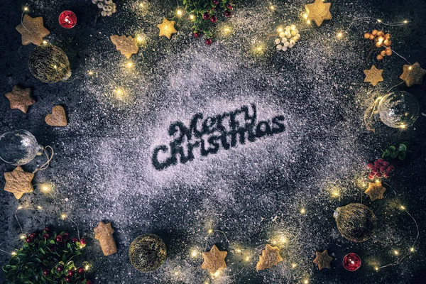 Merry Christmas text in snow Stock Picture