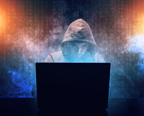 Hacker in front of his laptop