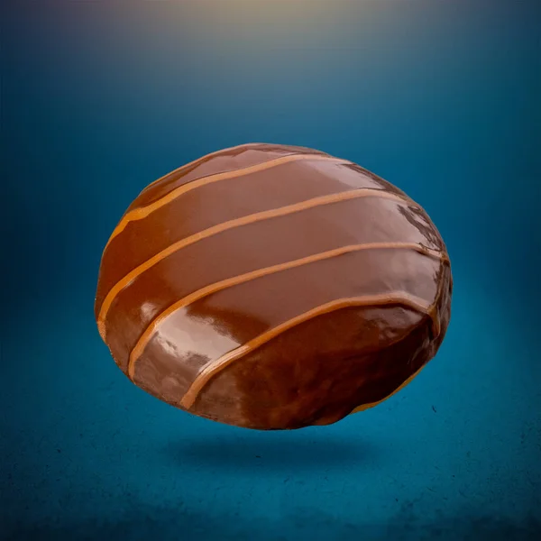 Fliegender Donut Mit Schokoladenglasur Und Gesalzenen Karamellstreifen Auf Blauem Hintergrund — Stockfoto