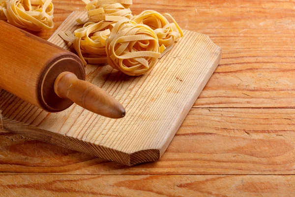 Pasta and rolling-pin — Stock Photo, Image