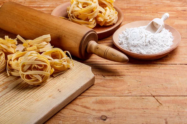 Pasta and rolling-pin — Stock Photo, Image