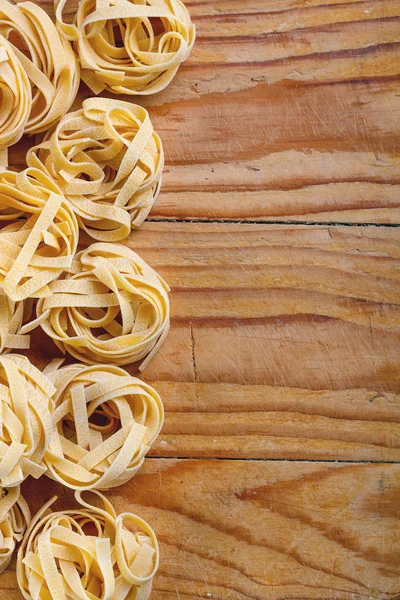 Dry pasta tagliatelle — Stock Photo, Image
