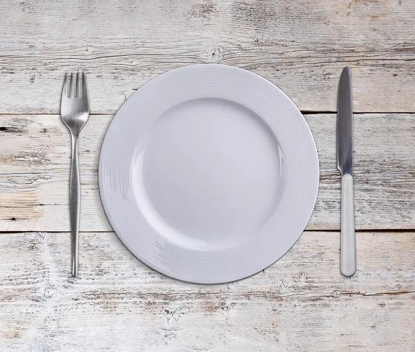 Plate with knife and fork — Stock Photo, Image