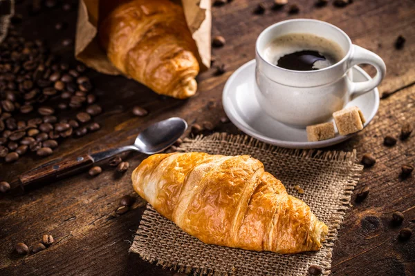 Café y croissant — Foto de Stock