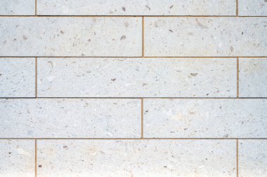 Dikdörtgen granit levhalı bir duvarın arka planı