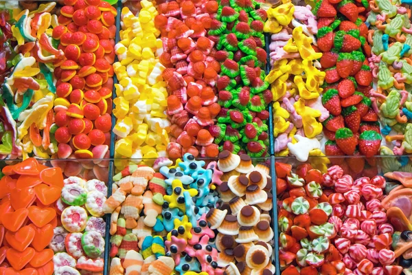 Barraca de mercado cheia de doces — Fotografia de Stock