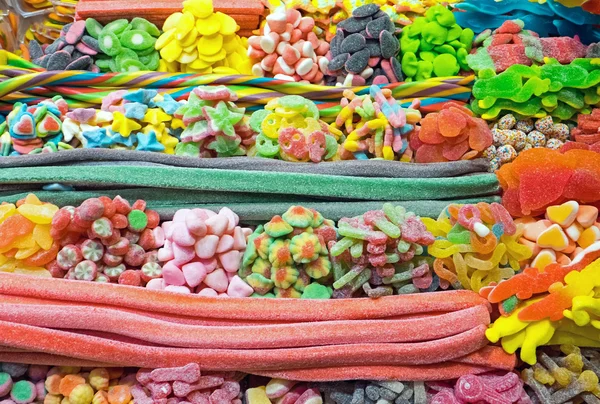 Pilhas de doces no Boqueria — Fotografia de Stock