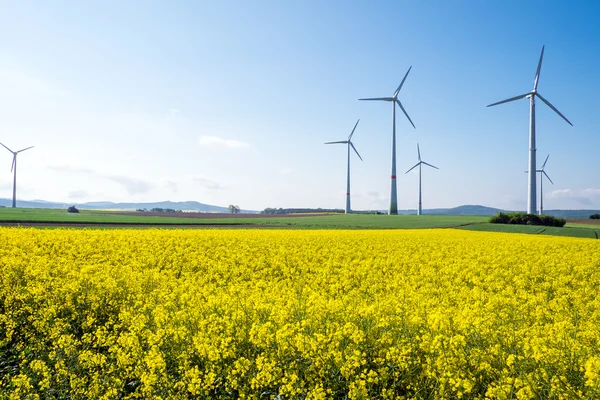 Windwheels and rapeseed in Germany — Stock Photo, Image
