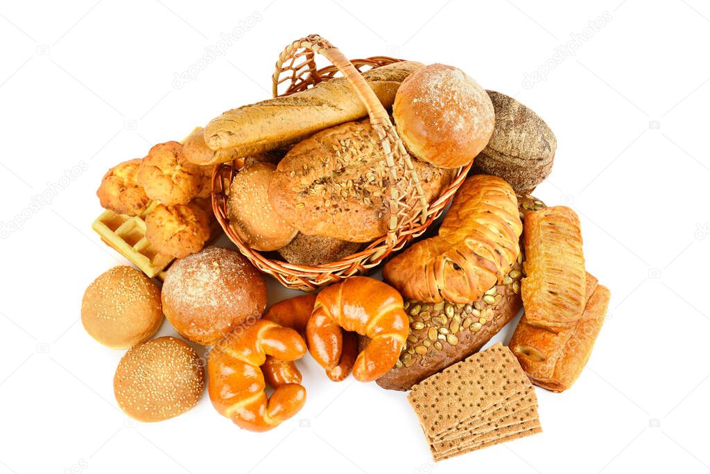 Black and white bread, croissants, buns and biscuits in a basket isolated on white background. Top view.