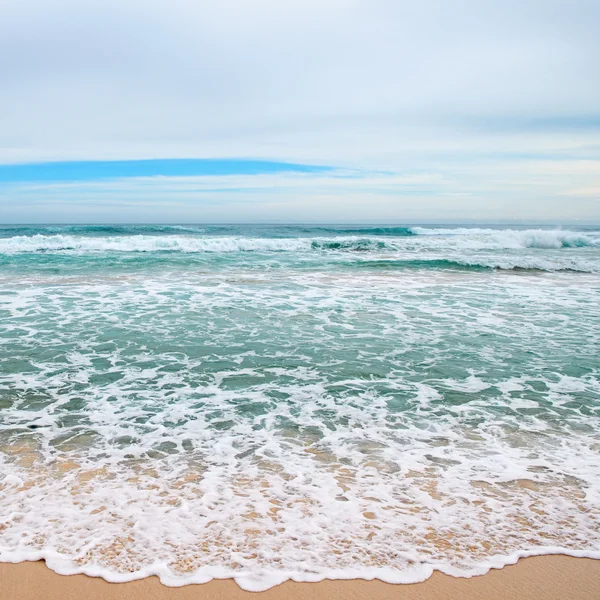 Waves sea and yellow sand — Stock Photo, Image