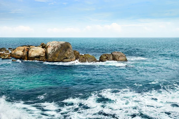 Large rock in the ocean — Stock Photo, Image