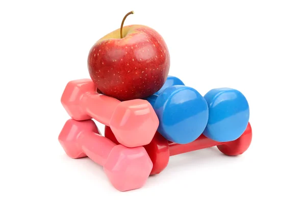 Set dumbbells and apple — Stock Photo, Image