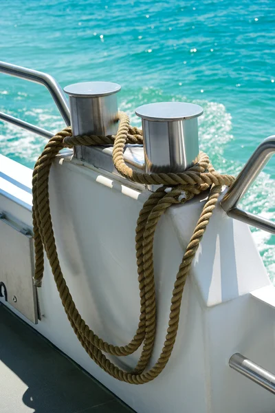 Bollard with coiled rope — Stock Photo, Image