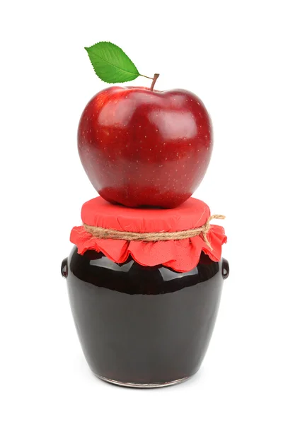 Red apple on jar of jam — Stock Photo, Image