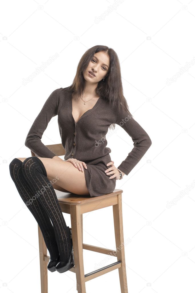 Schöne brunette Mädchen posiert in einem shop Schöne brunette Mädchen posiert in einem shop