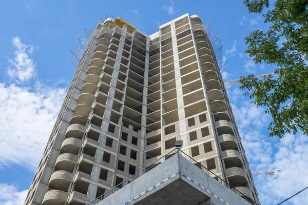 Construction of modern high-rise apartment building — Stock Photo, Image