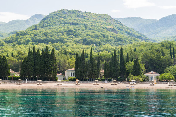 The Mediterranean coast, beaches, hotels in Budva mountains in the background. Montenegro