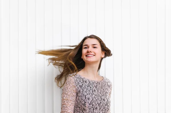 young woman's hair in motion