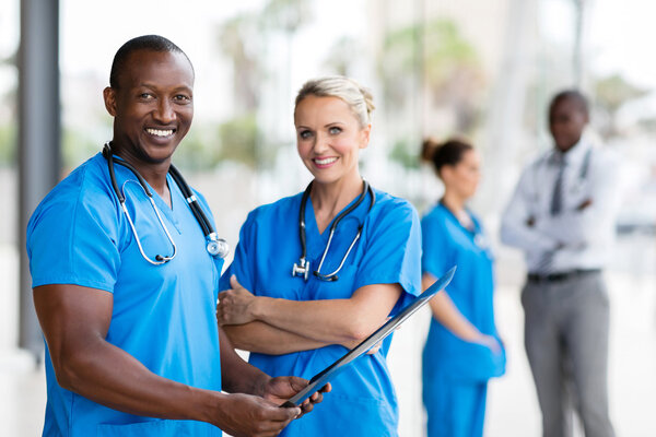 healthcare workers looking at x-ray