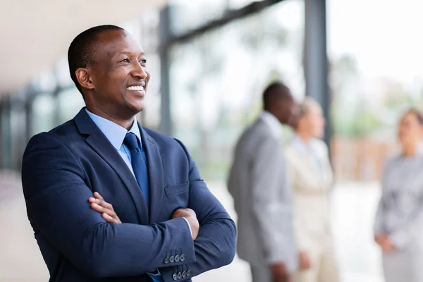 Businessman with arms crossed — Stock Photo, Image