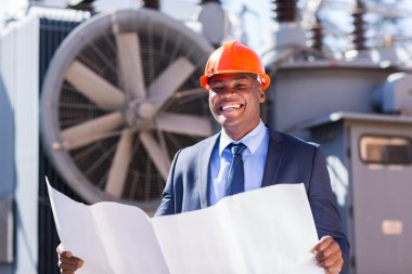 Elektrik Yöneticisi holding blueprint