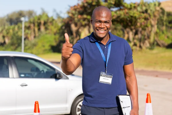 Afrikai driving school oktató — Stock Fotó