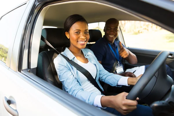 Young woman taking driving lessons — Stock Photo, Image