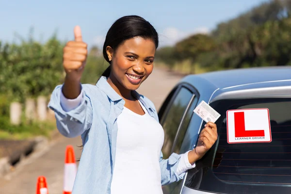 Learner driver holding driver's license — Stock Photo, Image