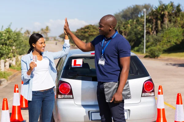 African girl and driving instructor — Stock Photo, Image