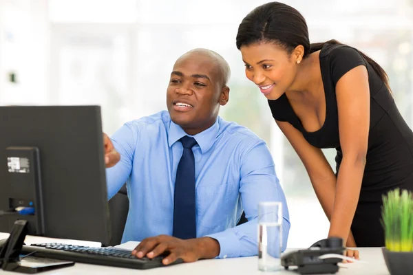 African businessman and secretary — Stock Photo, Image