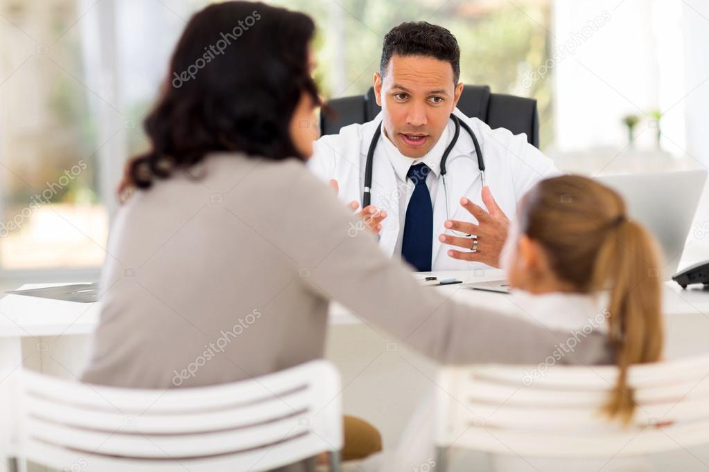 Pediatrician consulting little patient