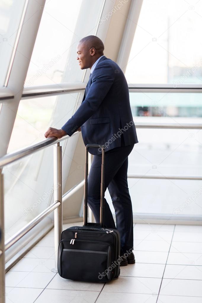 African businessman with luggage