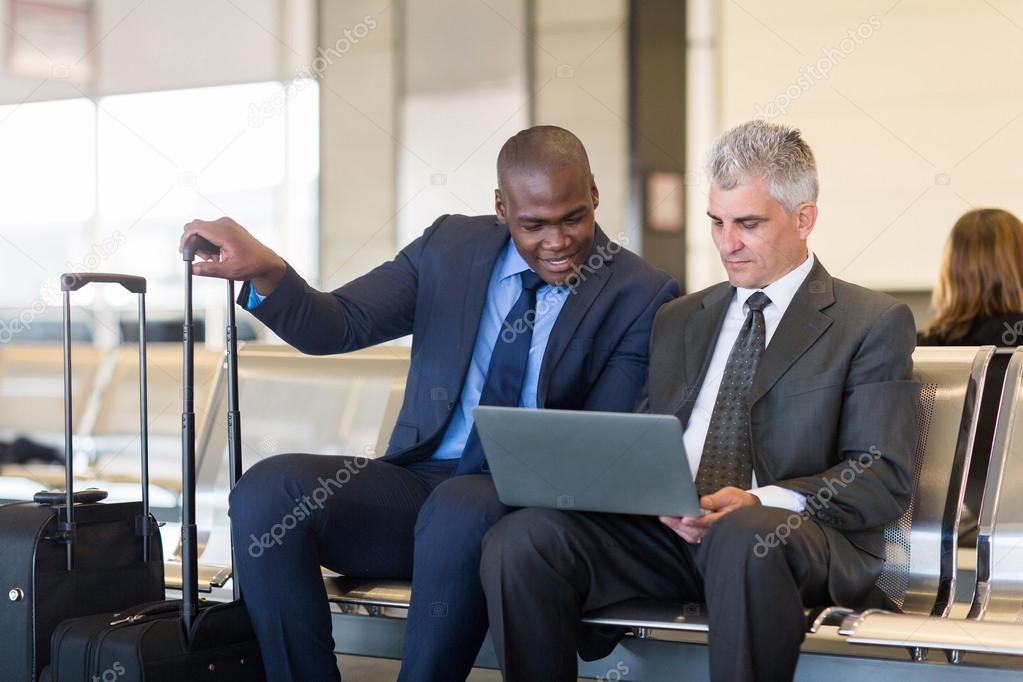 Businessmen working on laptop