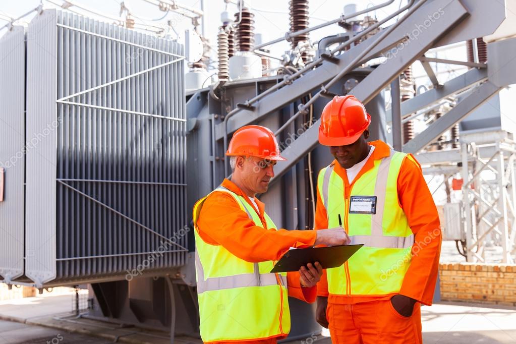 Electrical engineers discussing work — Stock Photo © michaeljung 58171911