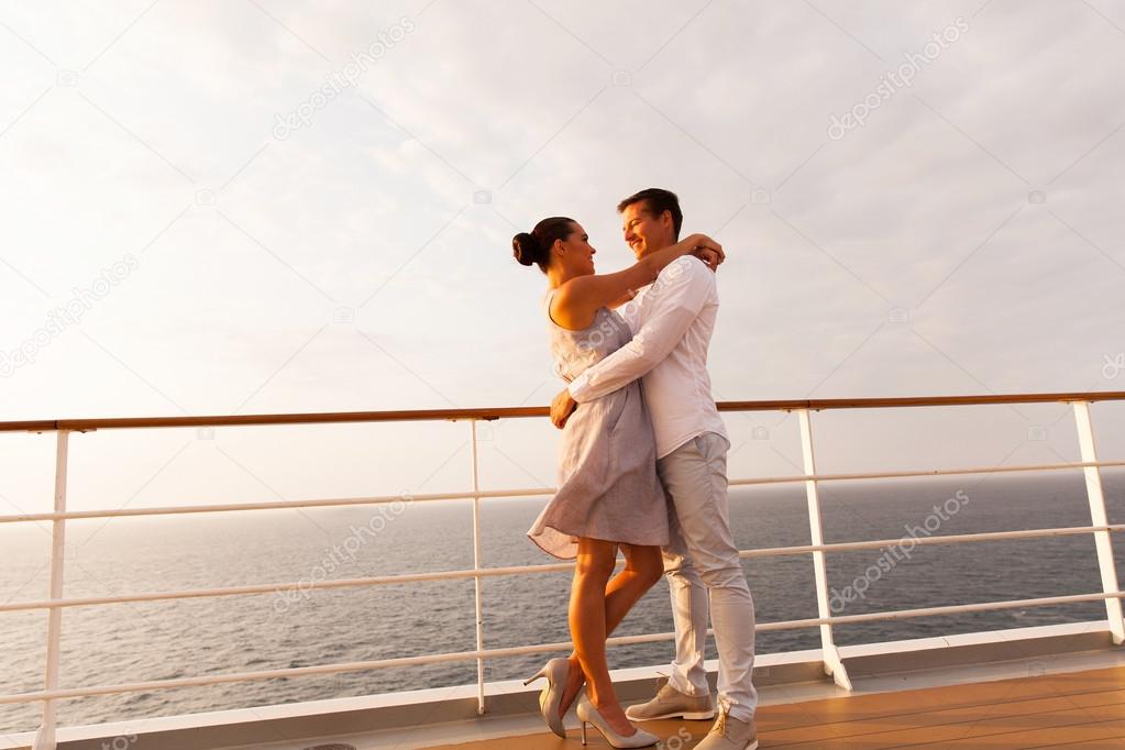 Lovely couple hugging on cruise