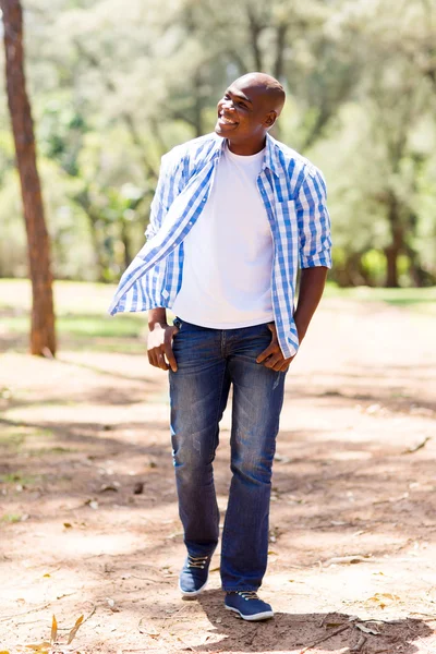 Man walking in the park — Stock Photo, Image