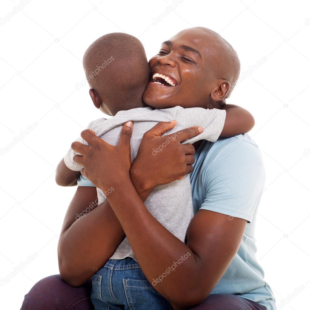 Man hugging his son