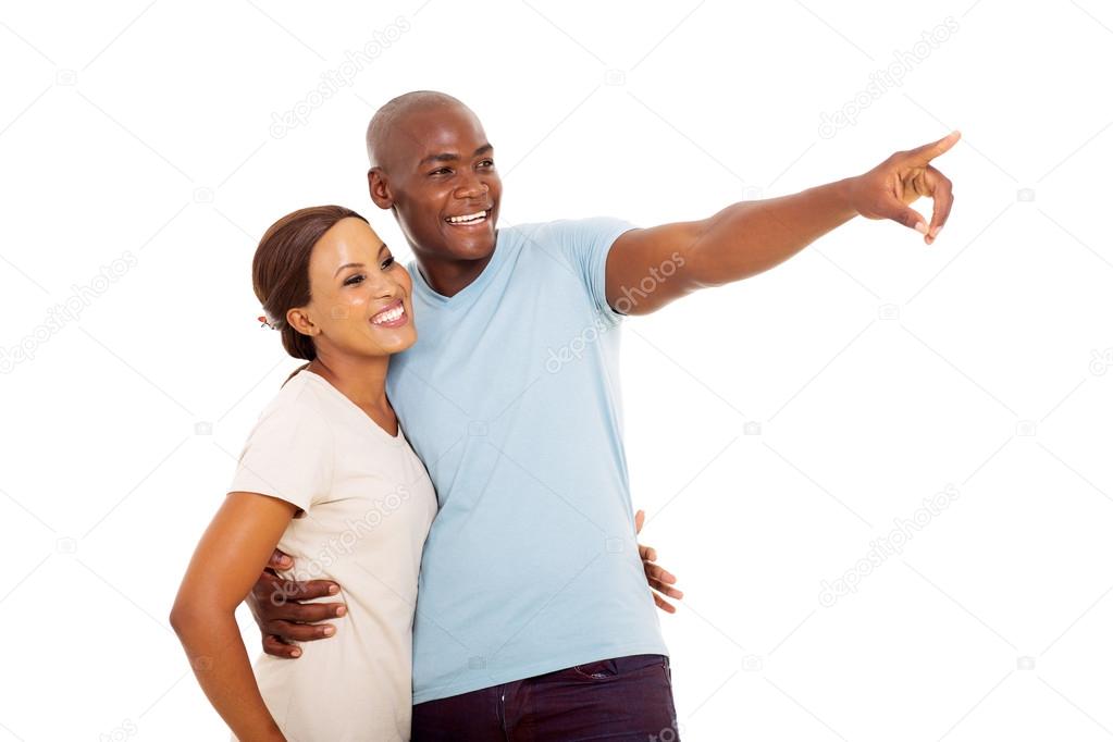 African couple pointing