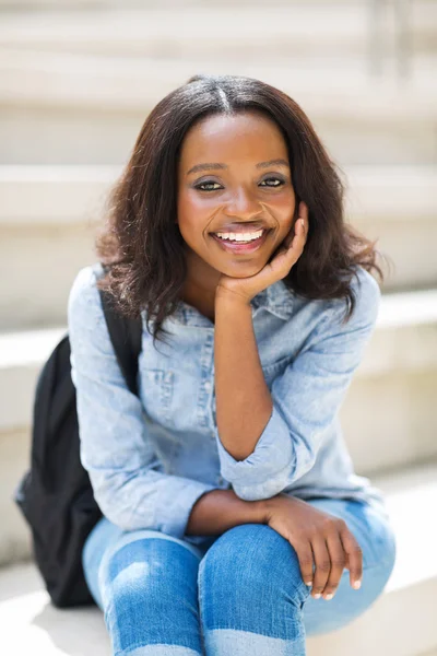 Student sitting outdoors — Stock Photo, Image