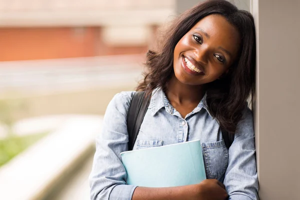 Student holding a book — Stock Photo, Image