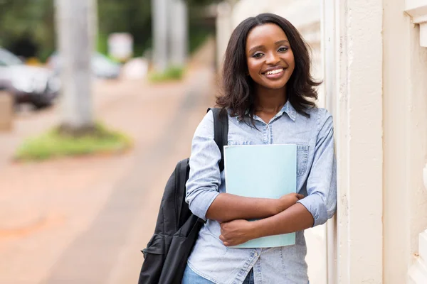 Student holding a book — Stock Photo, Image
