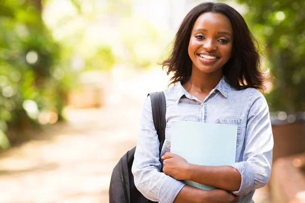 Student holding a book — Stock Photo, Image