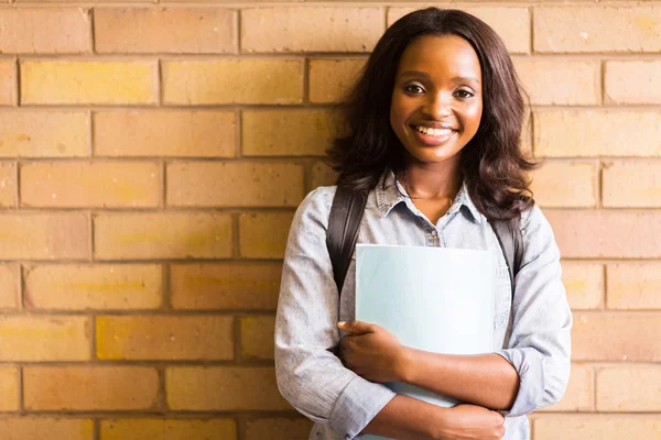 Girl leaning against a wall — Stock Photo, Image