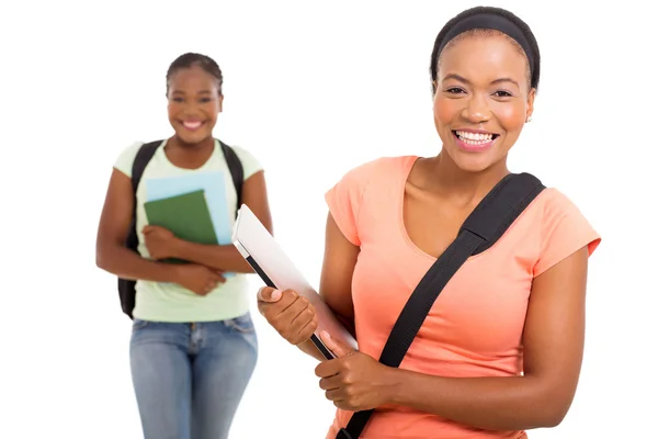 Estudiante universitario sosteniendo portátil — Foto de Stock