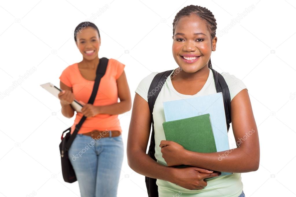 Female college students holding books
