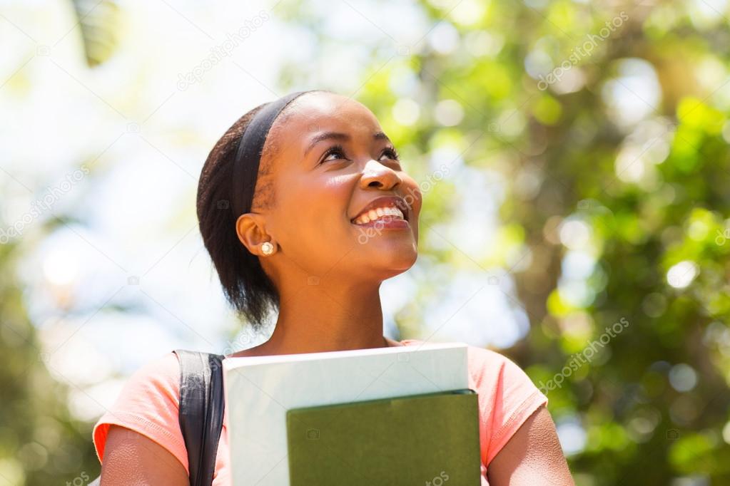 young female college student looking up