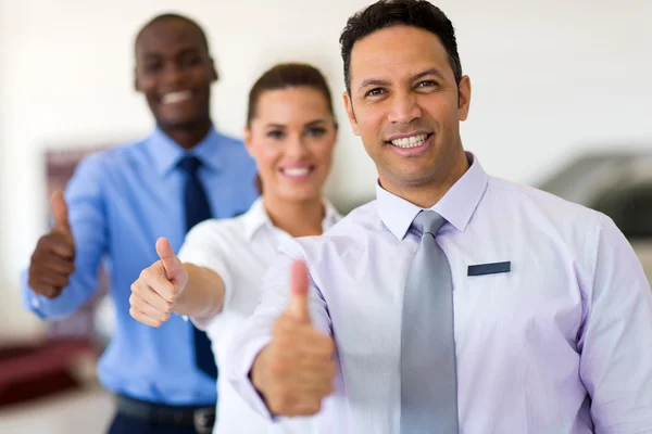 Business group giving thumbs up — Stock Photo, Image