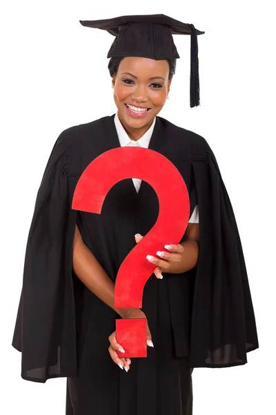 Young female graduate with question mark — Stock Photo, Image